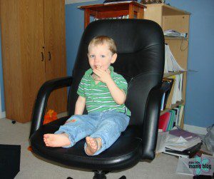 My office chair did double duty as a high chair, apparently. Note the avalanche of papers behind my kiddo. Were they caused by him or me? That's anybody's guess. But clearly, that whole myth about being able to keep up with the housework when you work from home really is just a myth. 