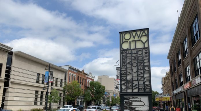 An image of the Iowa City sign on Washington Street in downtown Iowa City.