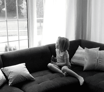An image of a girl at home.