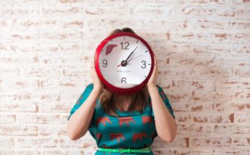 An image of a woman with a clock showing back to school morning routine