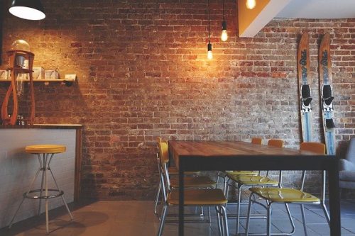 Image: brick walls, table in restaurant