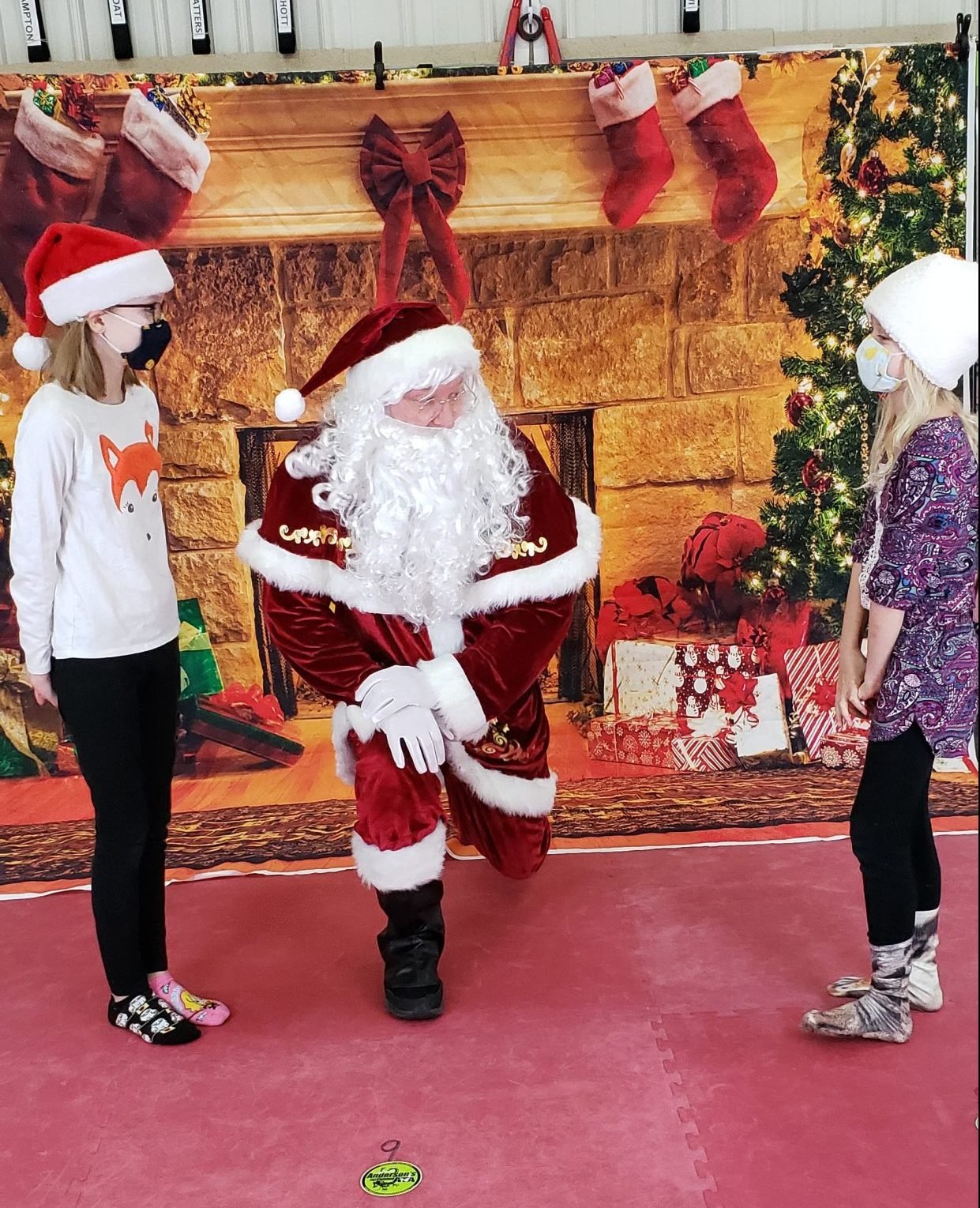 Photo of two girls with Santa