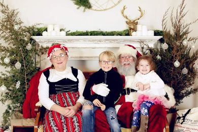 Photo of boy and girl with Santa